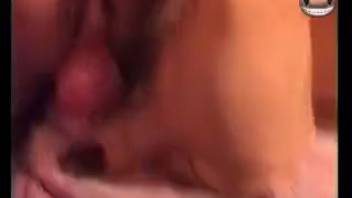 Lady masturbates with fingers prior to taking a canine cock in her pussy