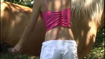Sunny outdoor adult content featuring animal encounters for the well-endowed spouse