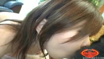 Dark-haired Asian whore gets roughly banged by the dog in perverted scenarios