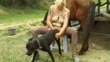 Alluring older woman prepares for a full pairing with her pets