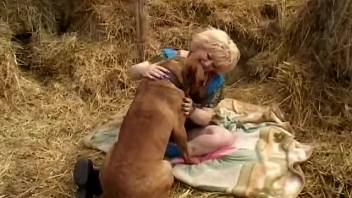 Blonde BBW blowing a dog's erect dick for the first time