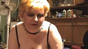 Curvy short-haired lady gearing up for intense bestiality action
