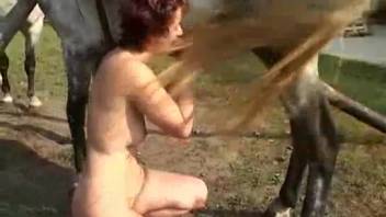 Experienced woman leans forward to accept a stud's enormous dick