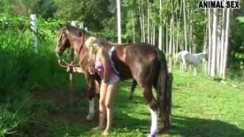 Naked blond handles enormous stallion cock like a genuine adult film star