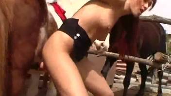 Ginger babe stroking a hung guy's dick on webcam