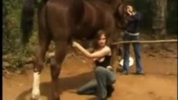 Aroused fair-haired woman prepares to accept a stud's manhood