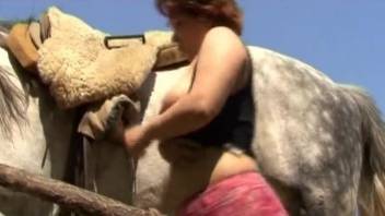Sexy mature woman in scenes of brutal animal porn XXX