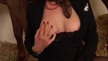 Fiery-haired hottie with massive tits screws a stud