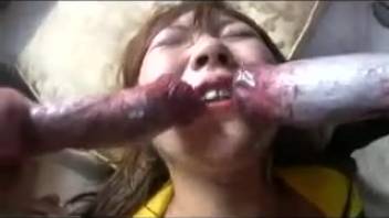 Voluptuous Japanese hottie roughly pounded by the dog and covered in cum